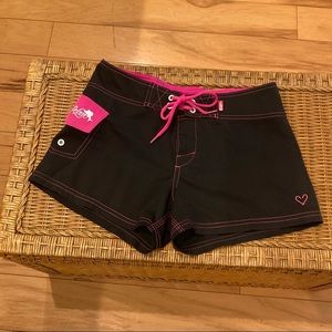 Pelagic Board shorts, woman’s size small, black and hot pink